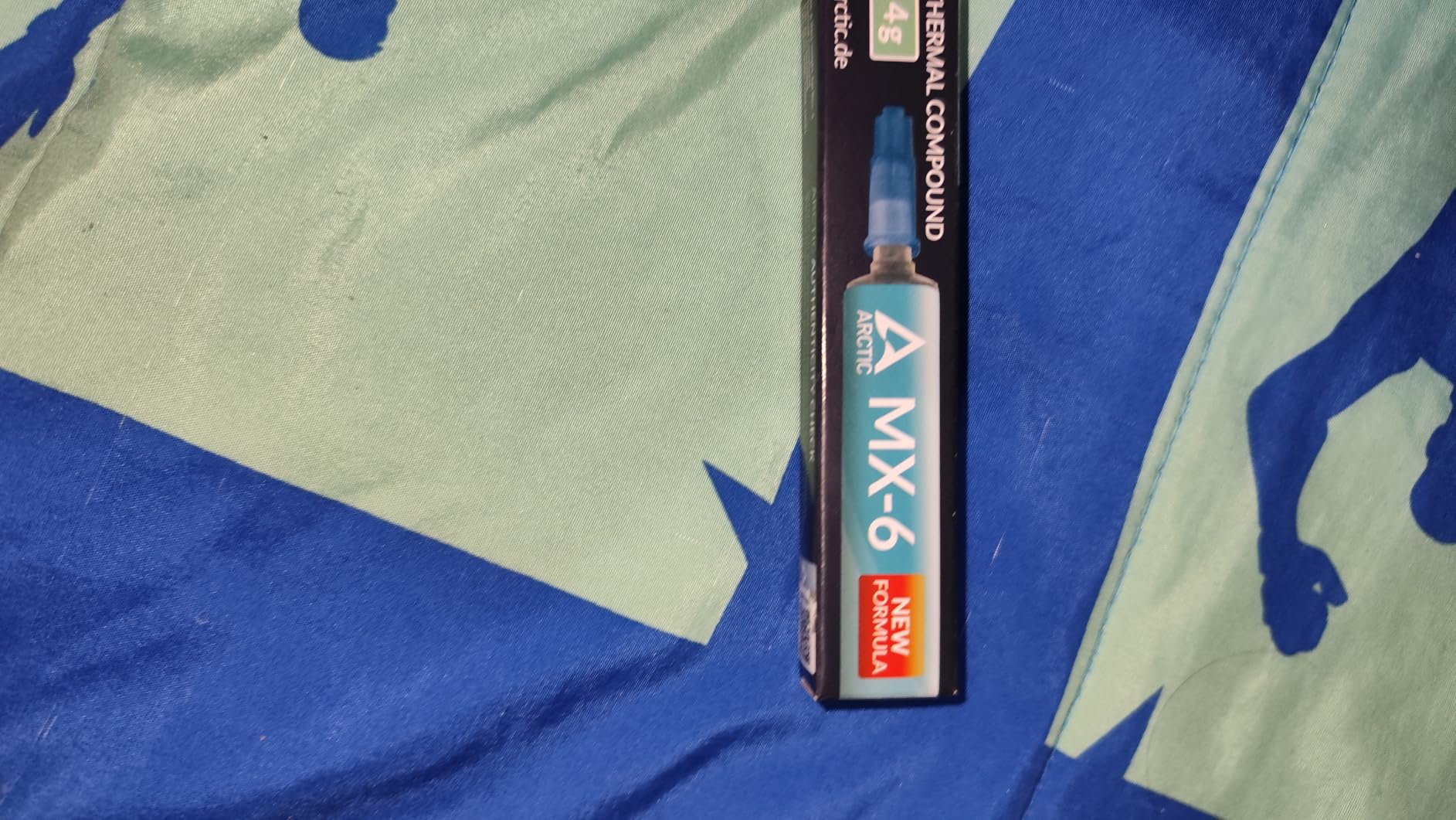 ARCTIC MX-6 (4 g) - Ultimate Performance Thermal Paste for CPU, Consoles, Graphics Cards, laptops, Very high Thermal Conductivity, Long Durability, Non-Conductive customer photo 2