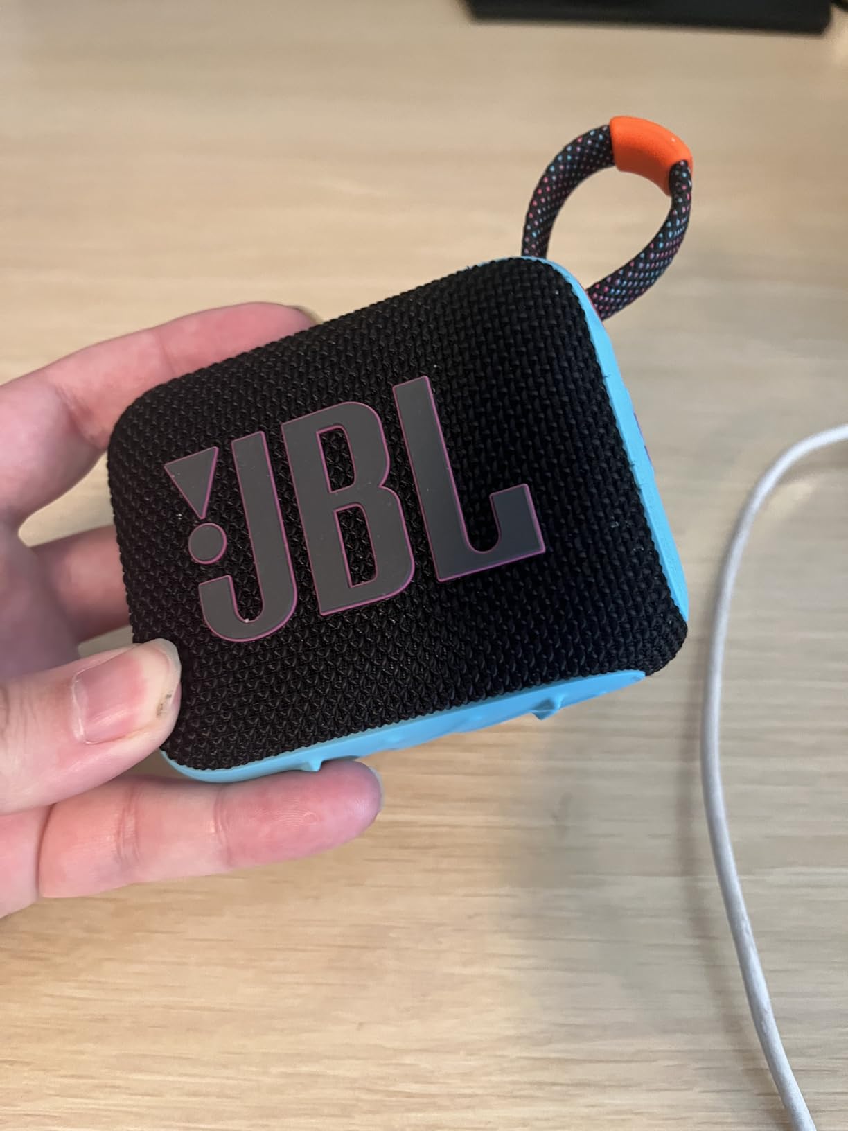 JBL Go 4 - Ultra-Portable, Waterproof and Dustproof Bluetooth Speaker, Big JBL Pro Sound with Punchy bass, 7-Hour Built-in Battery, Made in Part with Recycled Materials (Blue) customer photo 2