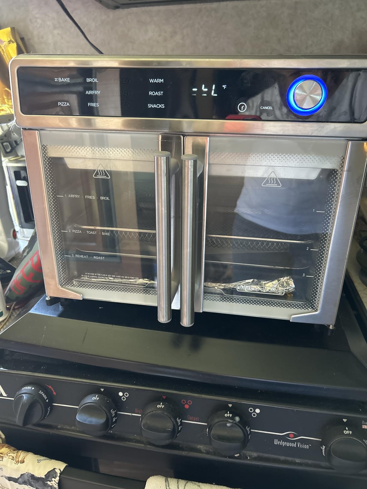 BLACK+DECKER Crisp 'N Bake Air Fryer Toaster Oven Combo, 12 in 1 Countertop Convection Oven Cooks Food Fast, Fits a Whole Pizza or 6 Toast Slices, French Doors with Stainless Steel Finish customer photo 1