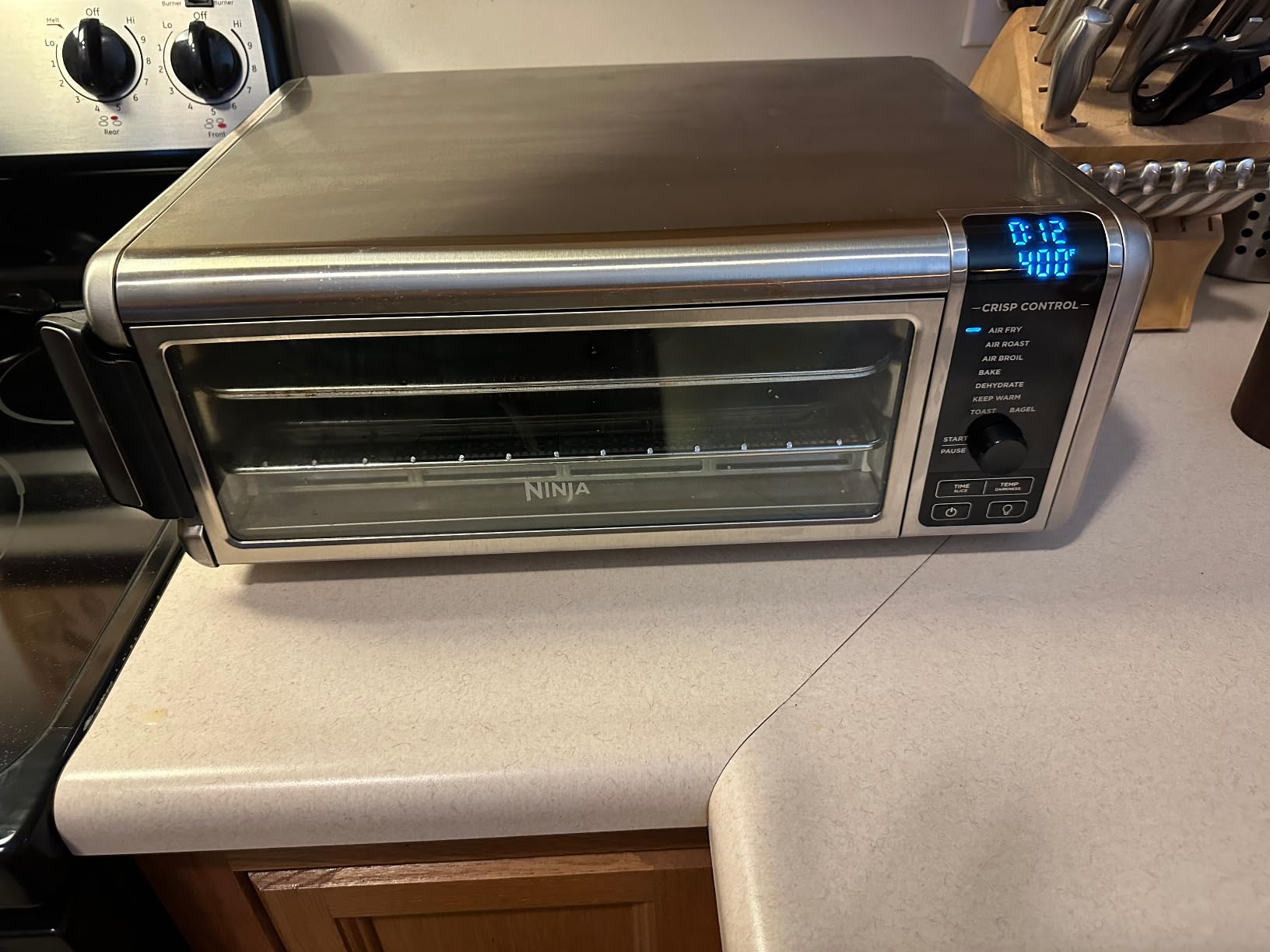 Ninja Air Fryer Toaster Oven Combo | 8-in-1 Functionality | Flip Up & Away for Storage Space | Air Fry Basket, Sheet Pan, Wire Rack & Removable Crumb Tray | 1800 Watt | Stainless Steel | SP151 customer photo 1