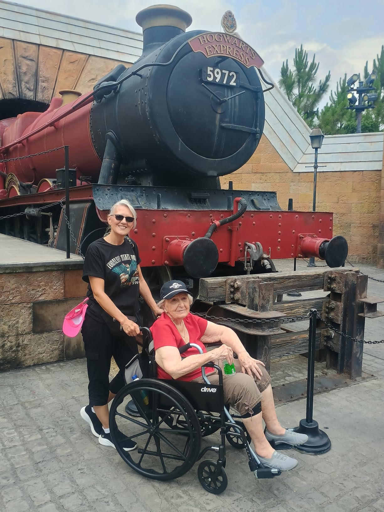 Drive Medical Silver Sport 1 Folding Transport Wheelchair, Black | Lightweight Folding Wheelchair Features Full Armrests and Removable Swing-Away Footrests for Easy Mobility customer photo 2