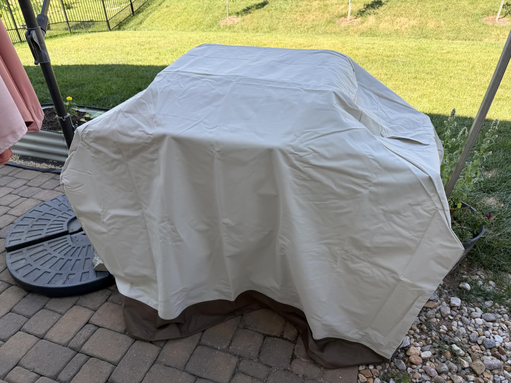 Amazon Basics Gas Grill Barbecue Cover, Weather Resistant, Anti-UV Protection with Secure Straps, Waterproof, 60 inch, Medium for Outdoor Grills, Beige customer photo 2