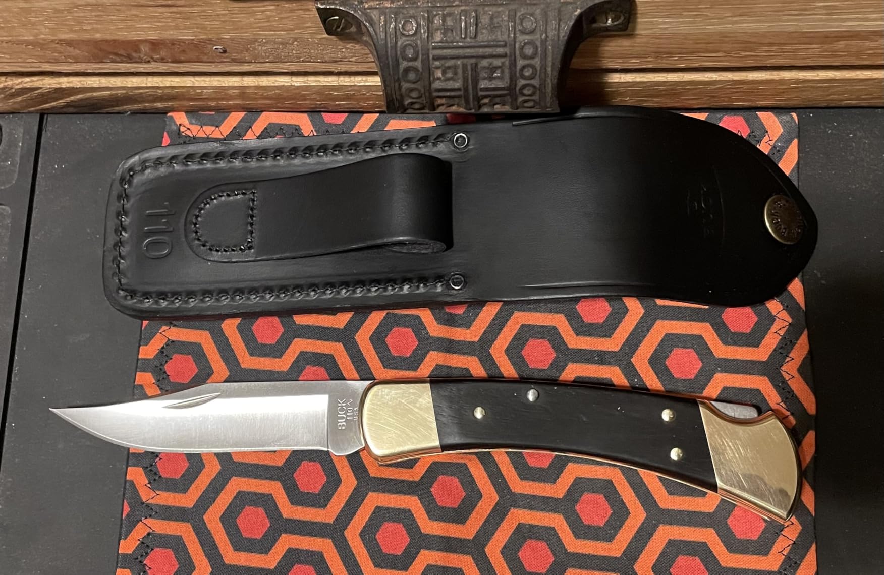 Buck Knives 110 Folding Hunter Lock-back Knife, Brass Bolsters, Ebony Handles, 3-3/4