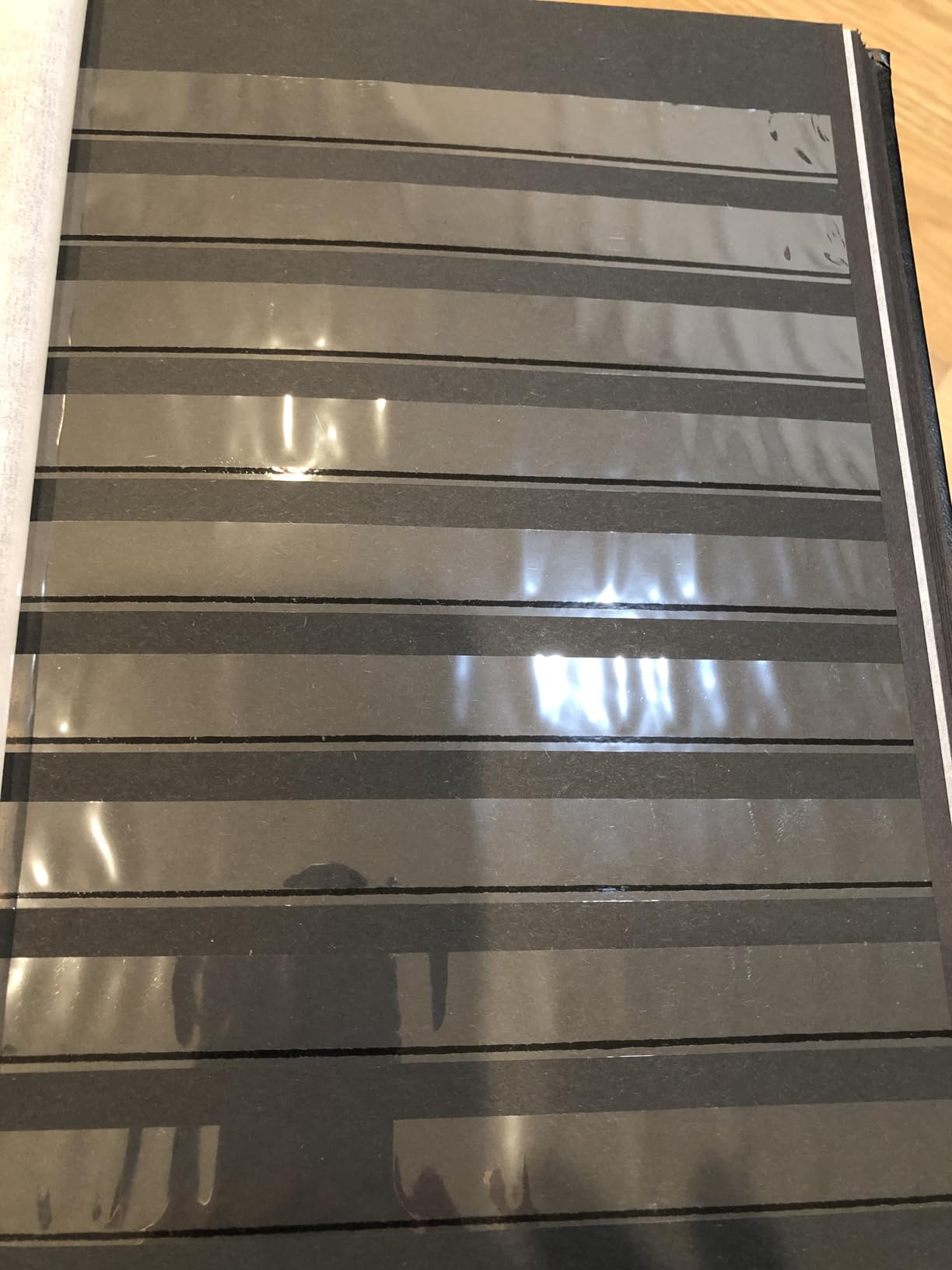LIGHTHOUSE – “COMFORT” Padded Leather Cover Stockbook for Stamps - 32 Black Cardstock A4 Pages with Clear Strips and Double Linen Hinges - Red customer photo 1