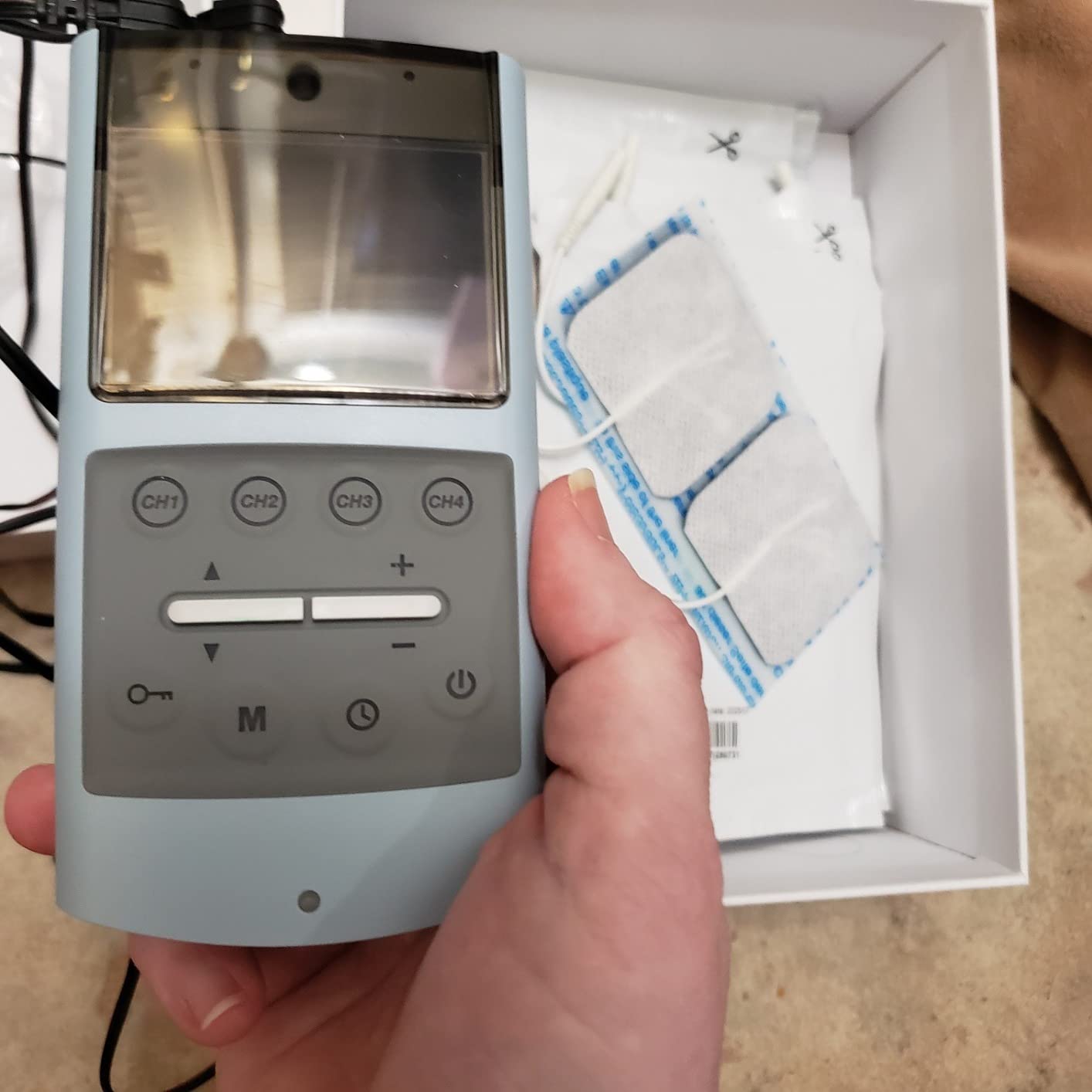 iStim TENS EMS Muscle Stimulator, EV-906 for Pain Relief and Muscle Strengthening, Japanese Gelled Electrodes Included customer photo 1