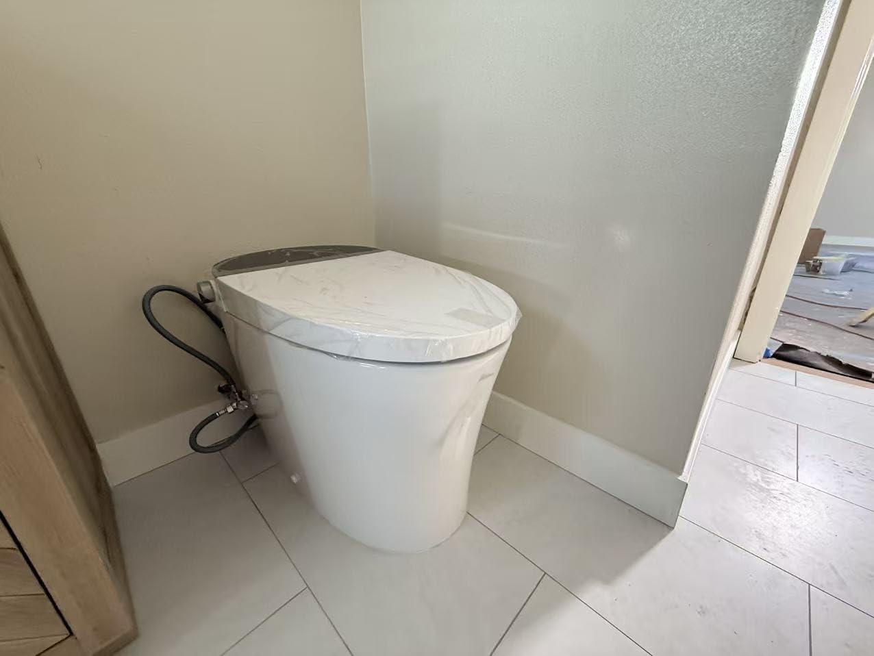 CANEST Smart Toilet, Smart Toilet with Bidet Built in, ADA Comfort Height, Intelligent Temp Control, Foot Sensor Operation, Warm Water, Heated Seat, Air Dryer, Digital Display (TC-100GE) customer photo 1