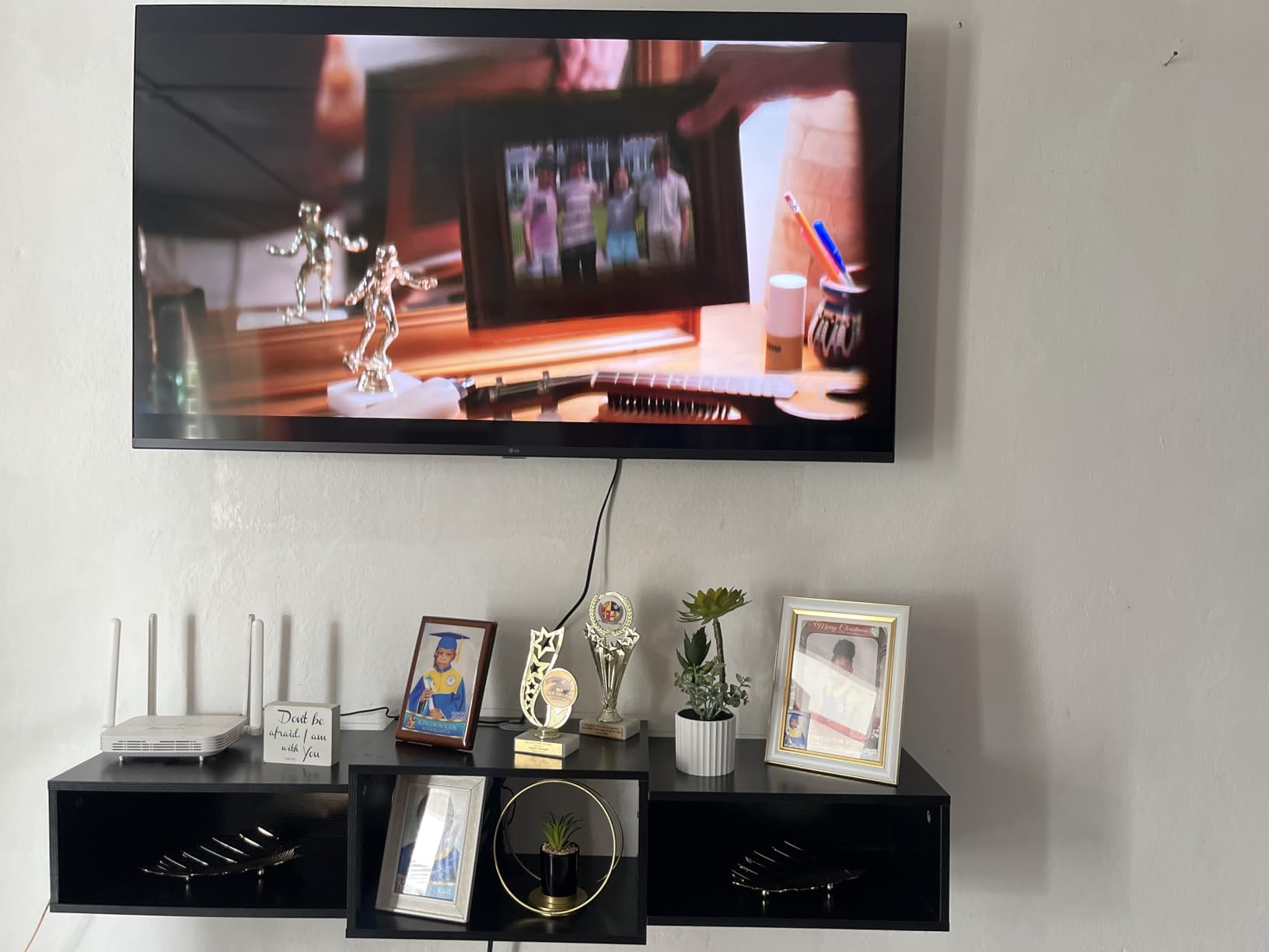 IBUYKE Floating TV Stand Wall Mounted with Power Outlet,Modern Wood Wall Mounted Media Console Shelf,Floating Entertainment Center for Under TV Storage for Living Room Bedroom Office,Black WST001B- customer photo 1