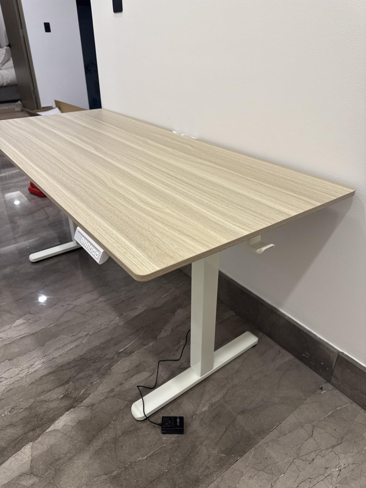 HUANUO 32x19 Inch Small Electric Standing Desk, Adjustable, Light Walnut customer photo 1
